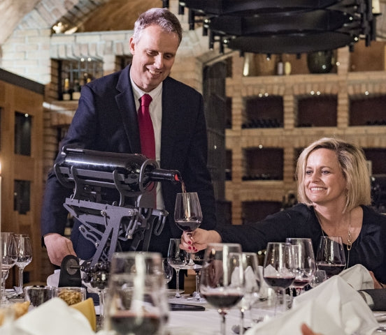 MagnuMaster in service, pouring large-format wine by the glass